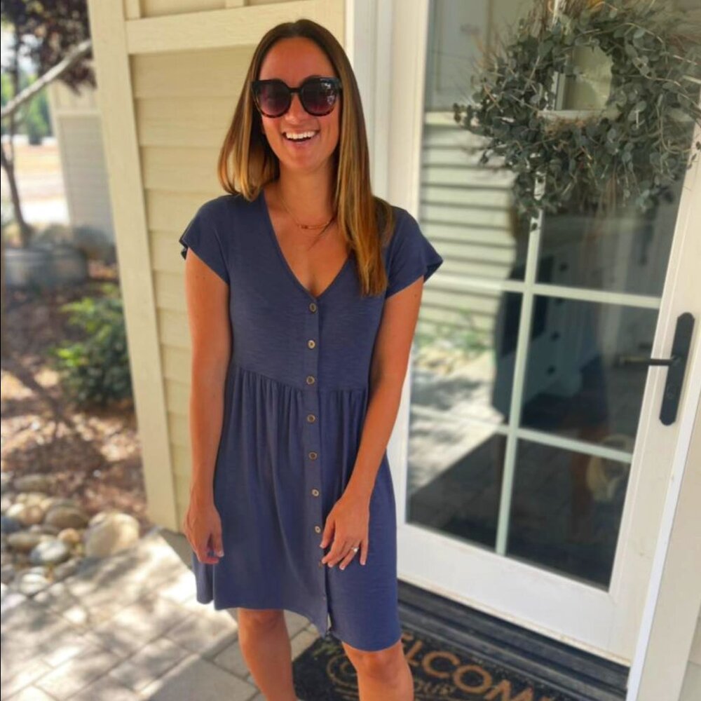 babydoll dress with a V-neckline that hits above the knee.